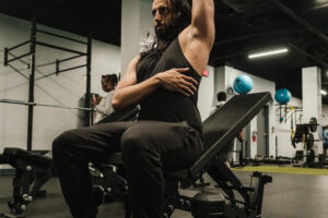 One arm dumbbell triceps extensions
